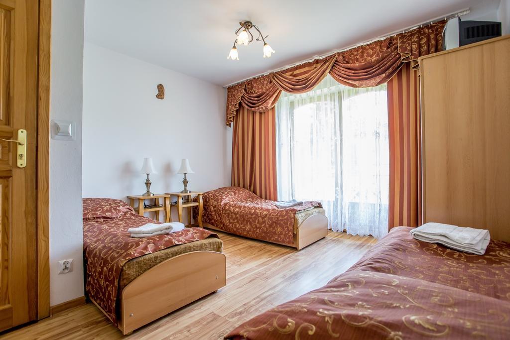 Отель Pod Modrzewiami Закопане Номер фото
